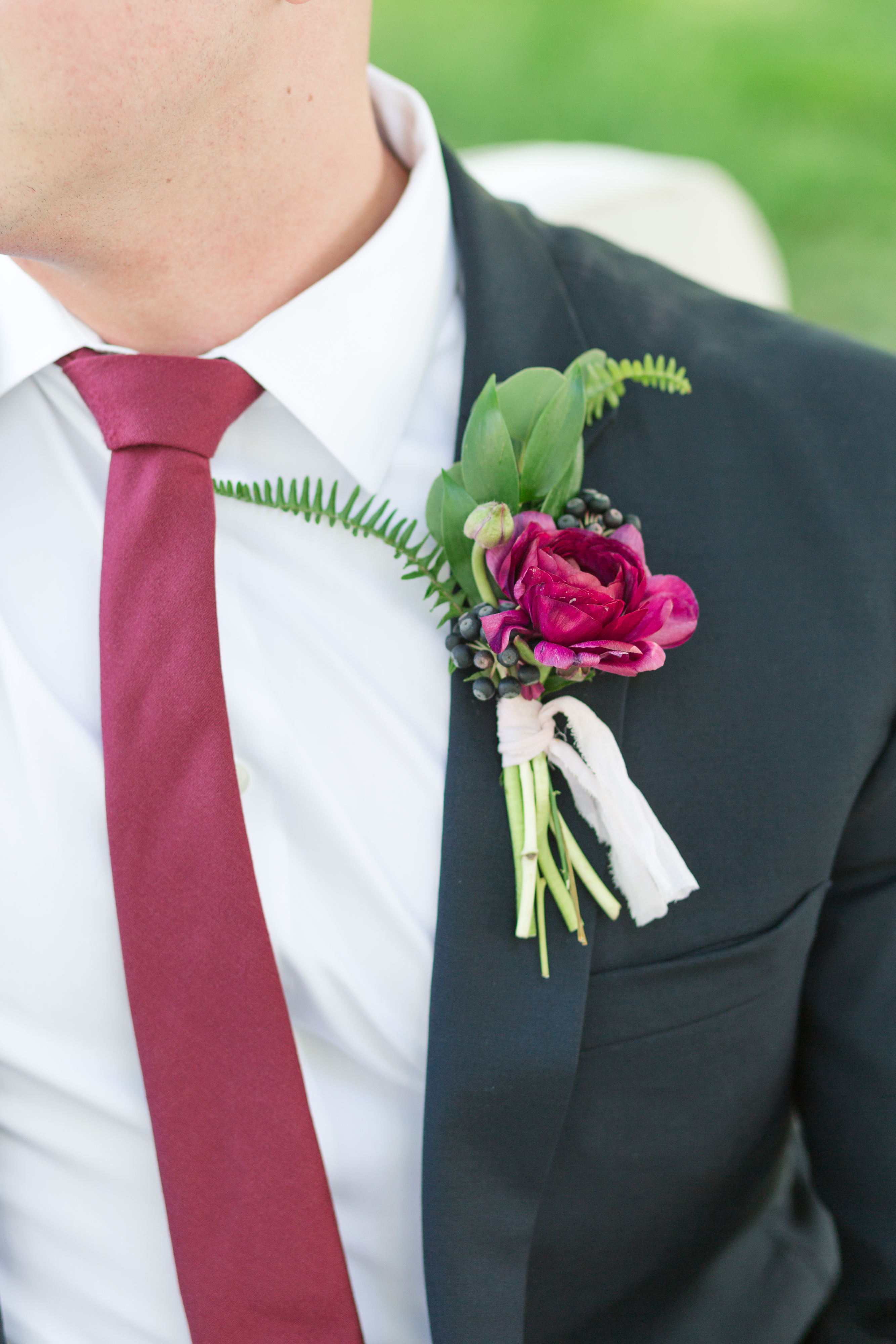 Raleigh wedding planner, Services, Jamie Blow Photography, Downtown Raleigh Wedding, groom with burgundy flower