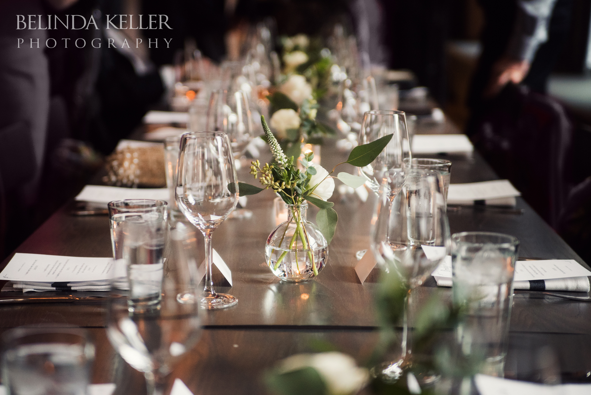 long banquet style table with modern table setting