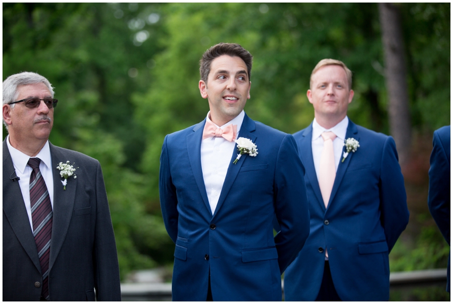 groom seeing bride walk down the aisle