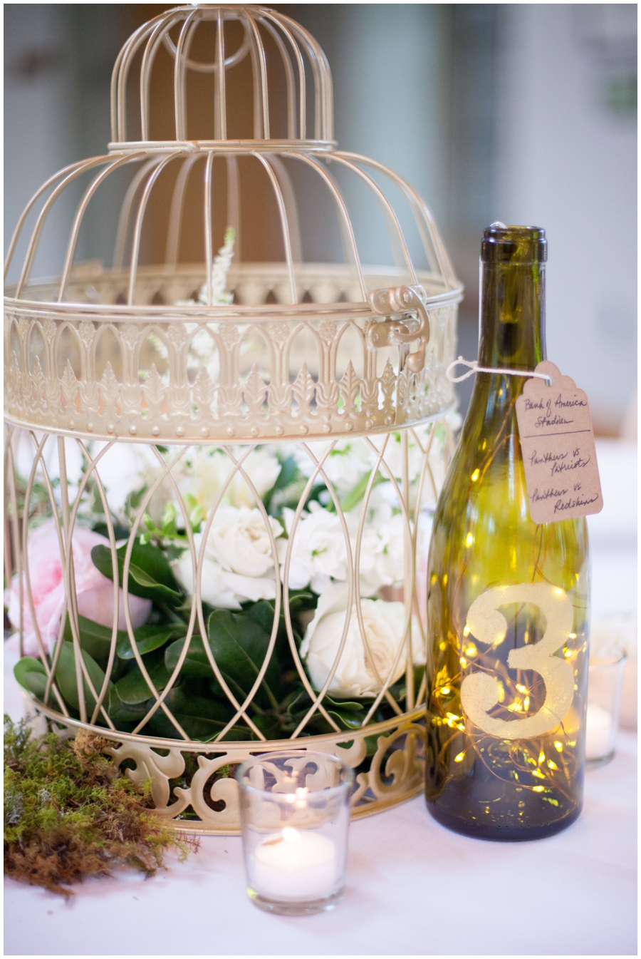 lantern centerpiece with wine table number